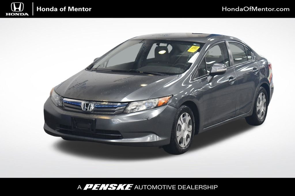 Used 2012 Polished Metal Metallic Honda Hybrid image 1
