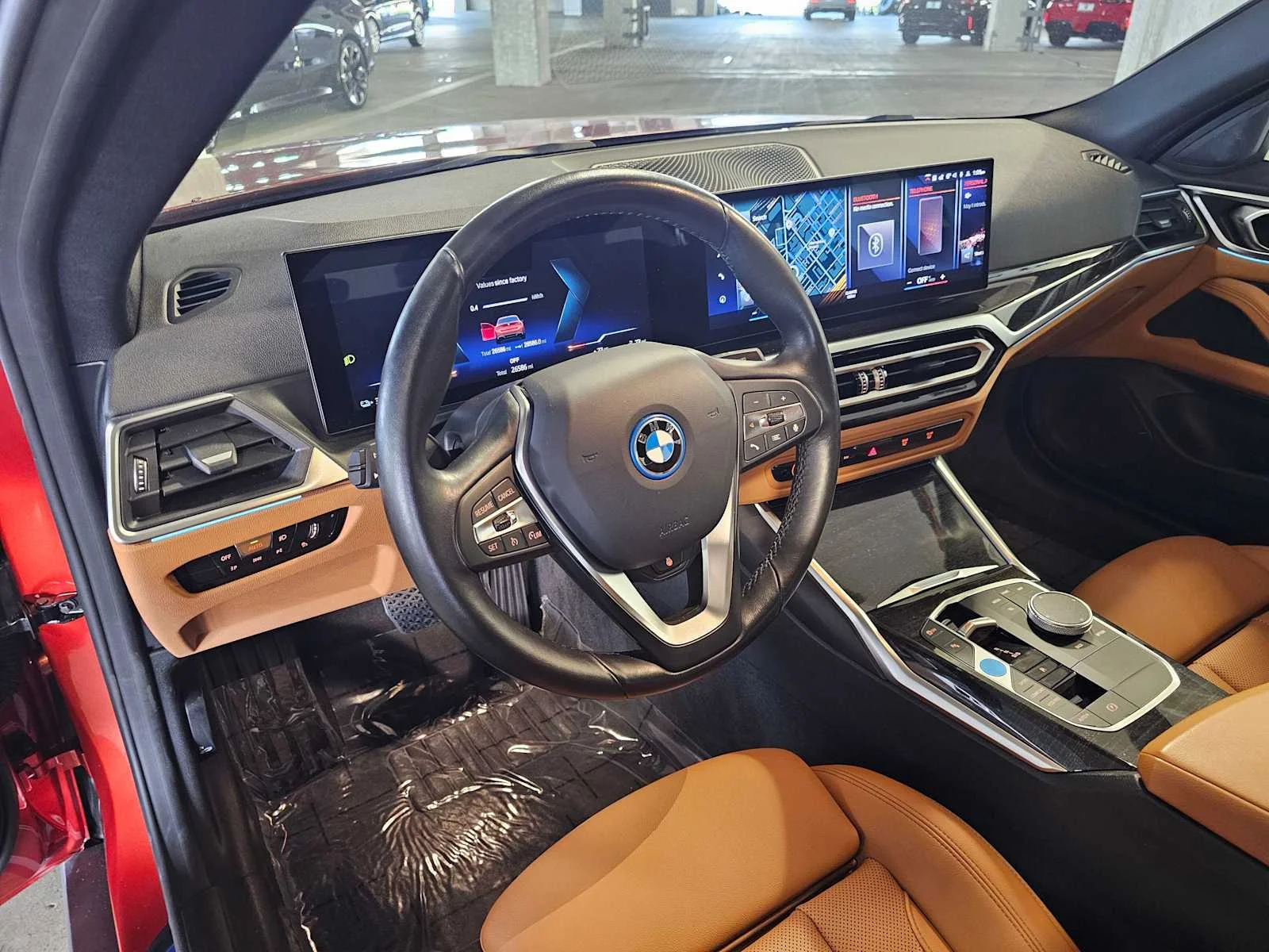 Certified Used 2023 Sunset Orange Metallic BMW eDrive35 image 2