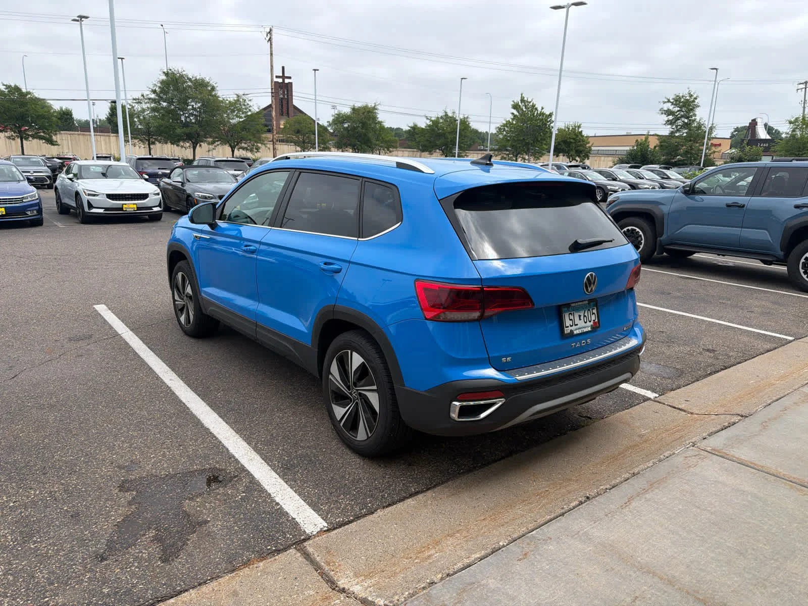 Certified 2024 Volkswagen Taos SE with VIN 3VVUX7B22RM031444 for sale in Saint Louis Park, Minnesota
