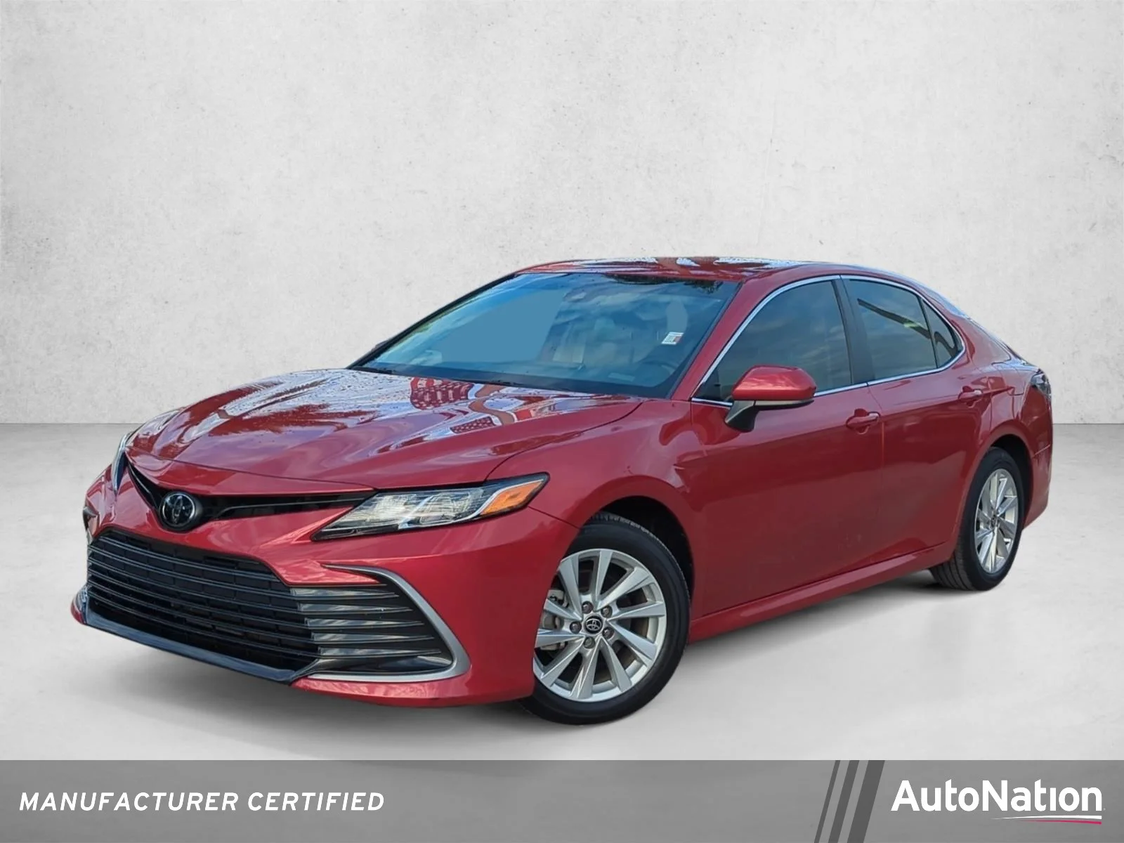 Used 2024 Supersonic Red Toyota LE image 1