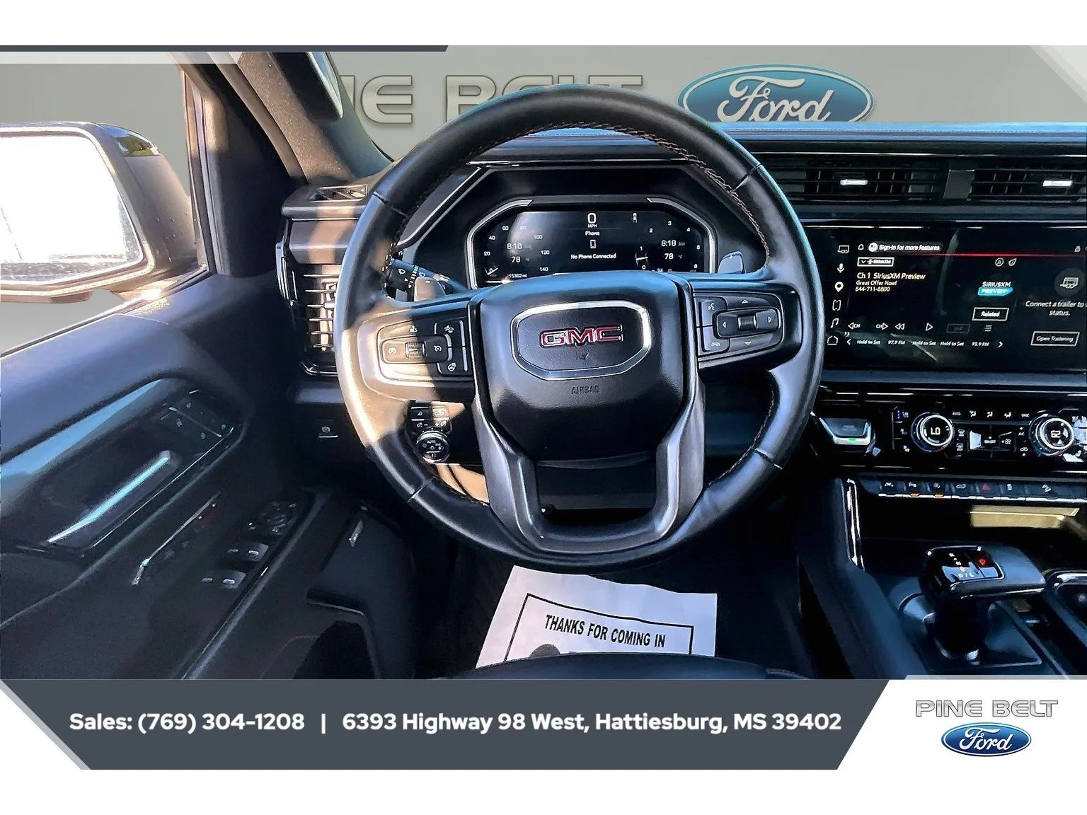 Used 2023 Deep Bronze Metallic GMC AT4 image 5