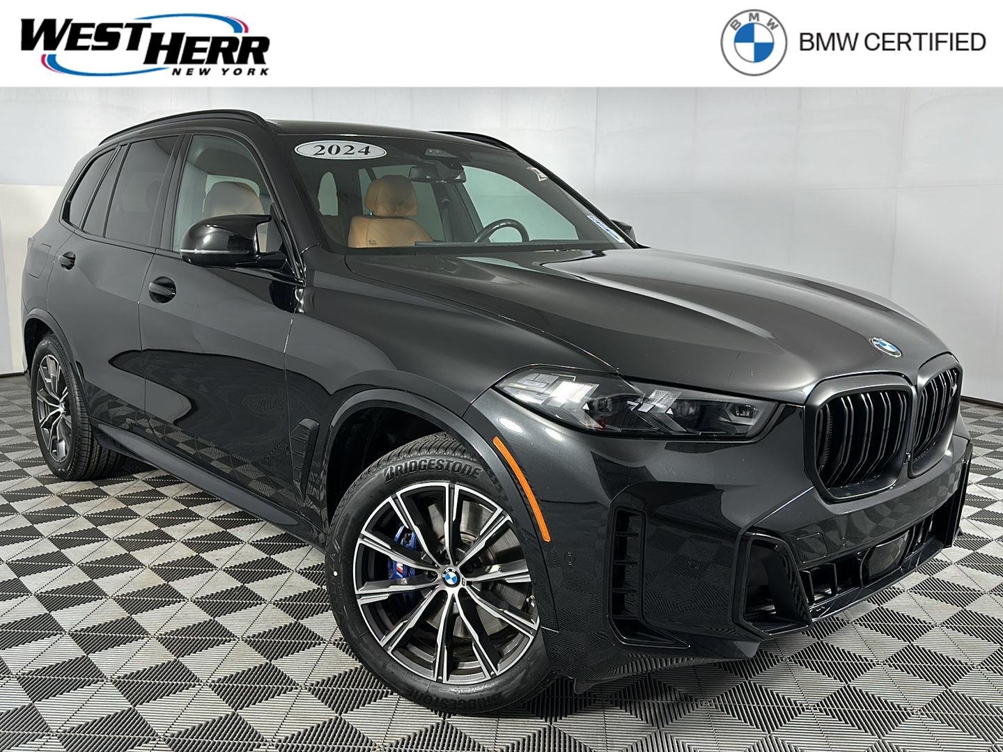 Certified Used 2024 Black Sapphire Metallic BMW M60i image 1