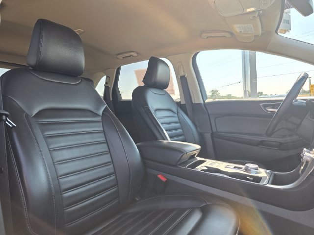 Used 2024 Agate Black Metallic Ford SEL image 16