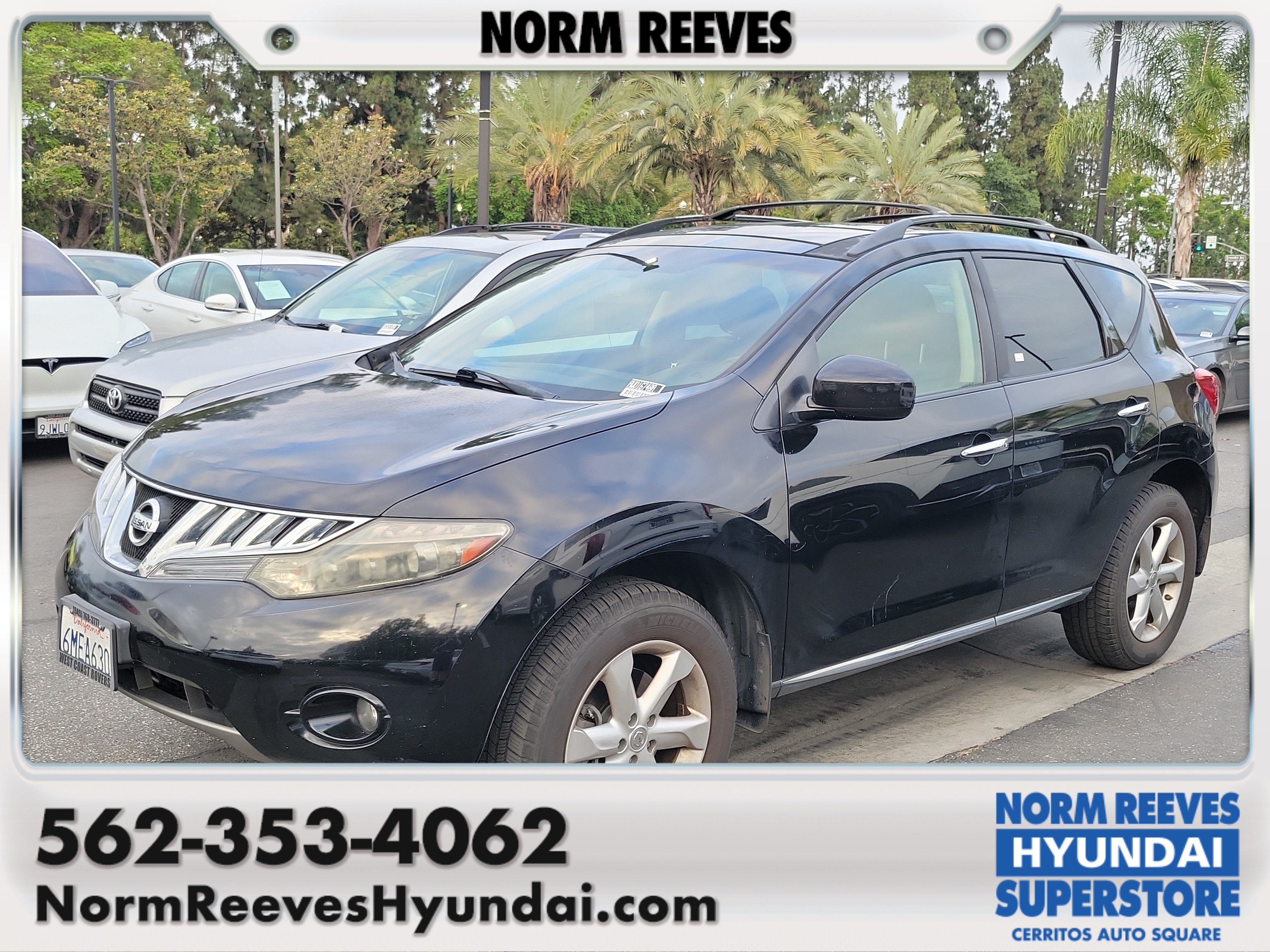 Used 2010 Super Black Nissan SL image 1