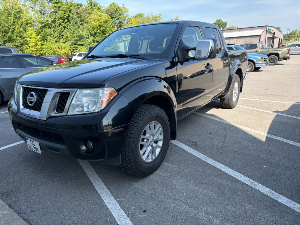 Used 2019 Magnetic Black Pearl Nissan SV image 1