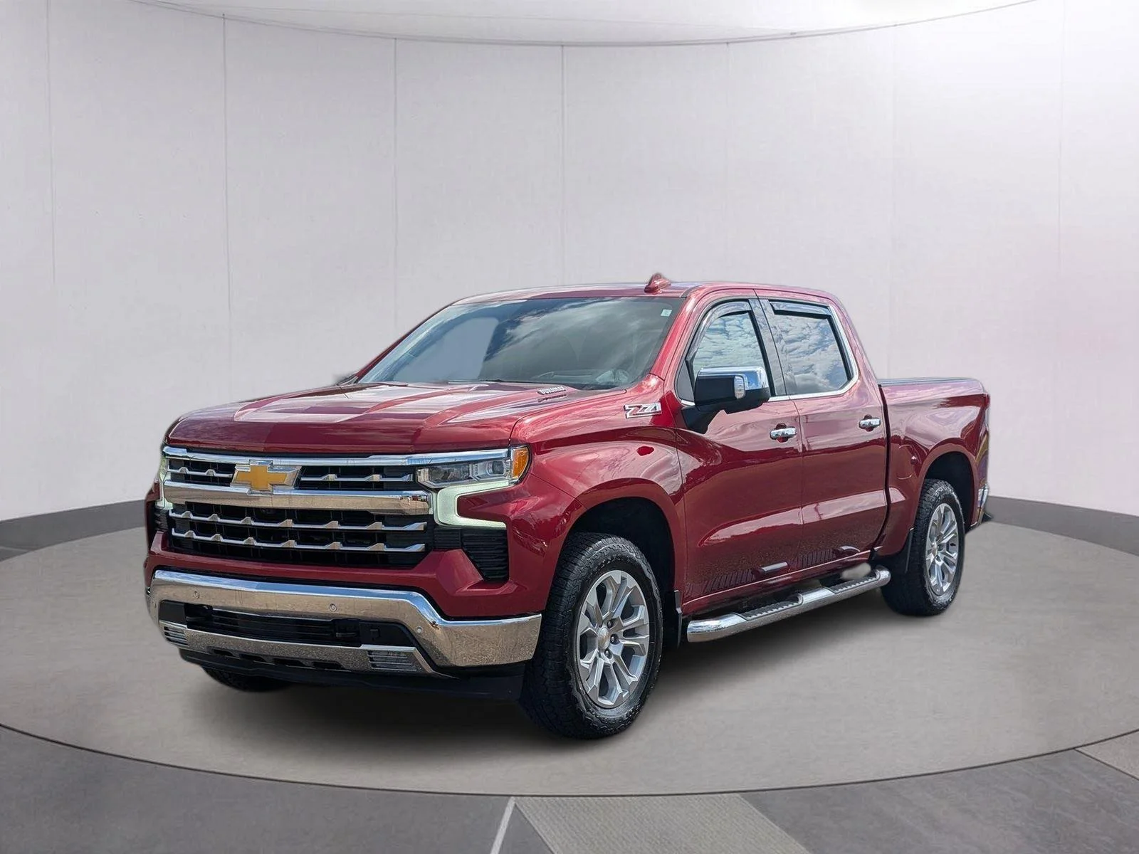 Used 2025 Radiant Red Tintcoat Chevrolet LTZ image 1