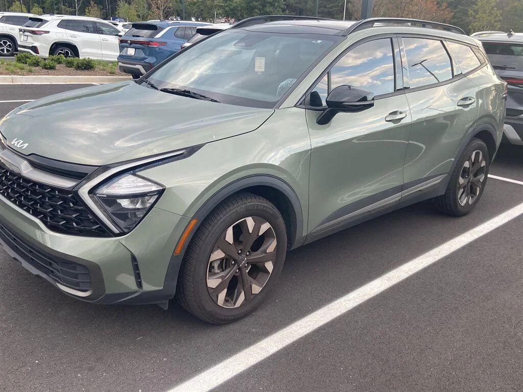 Used 2023 Jungle Green Kia X-Line image 1