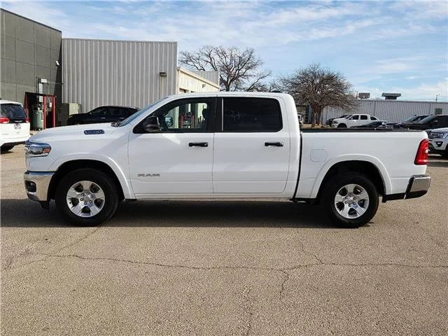Used 2025 Bright White Clearcoat RAM Big Horn/Lone Star 4x4 Crew Cab 144.5 in. WB image 2