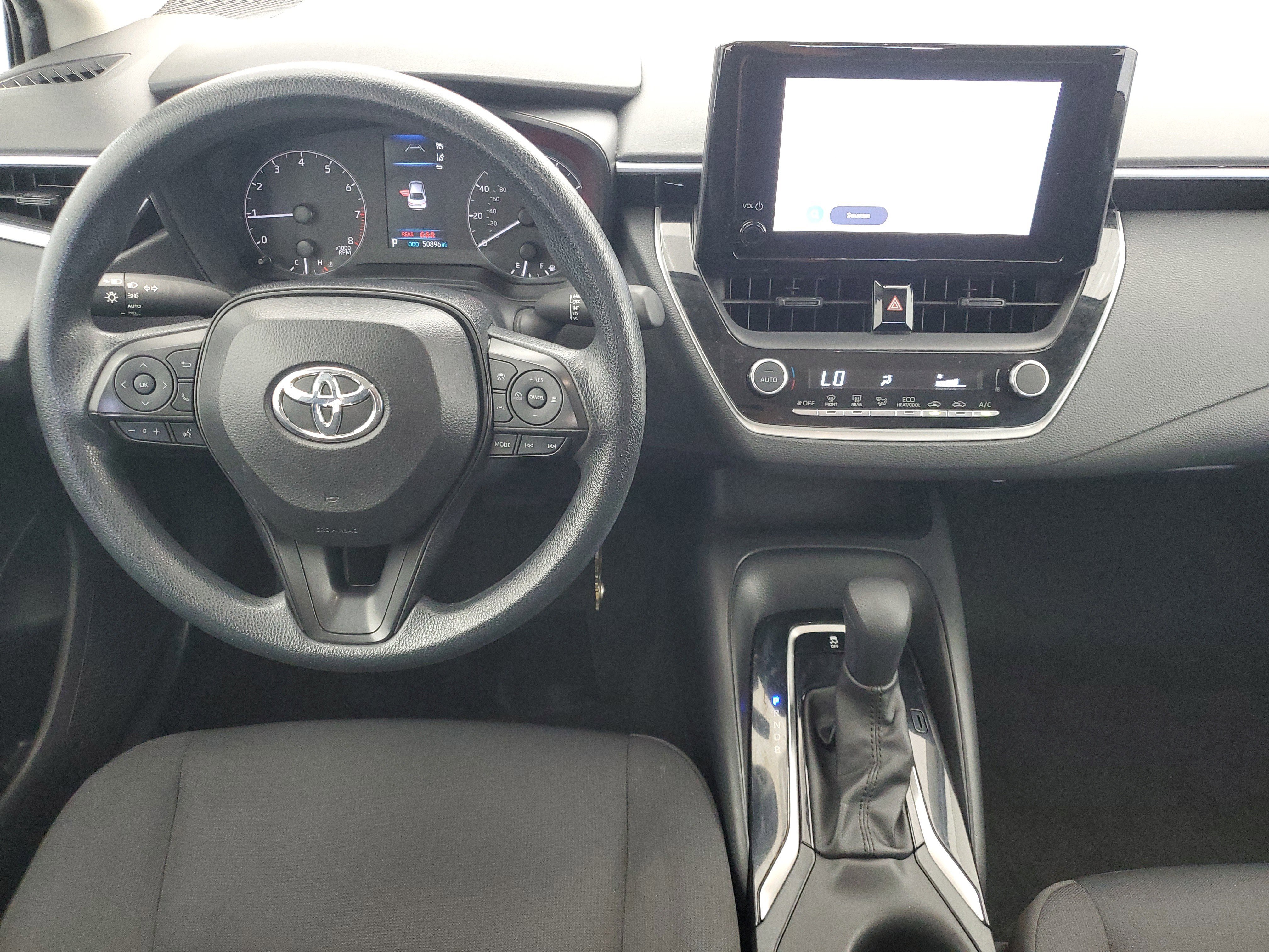 Used 2024 Classic Silver Metallic Toyota LE image 16