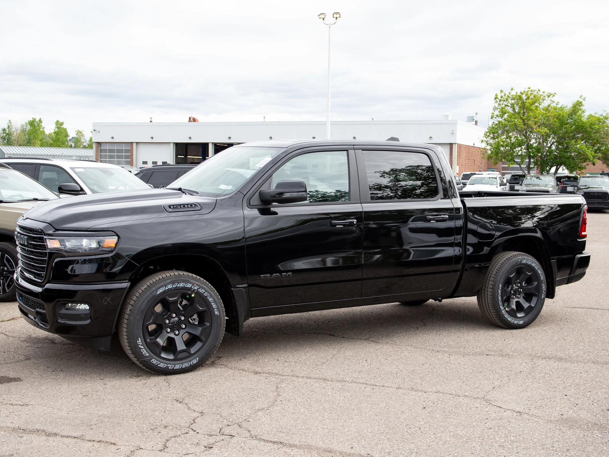 Used 2026 Black RAM Sport* Crew Cab 4x4, Panoramic Sunroof, Heated Seats/Wheel, Adaptive Cruise image 2