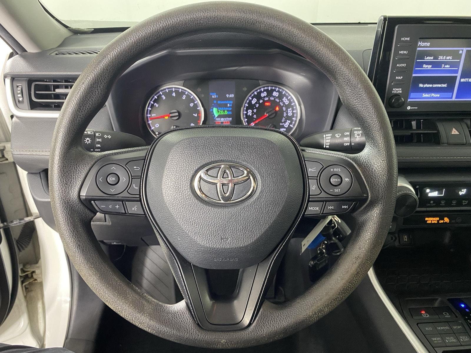 Used 2021 Super White Toyota LE image 13