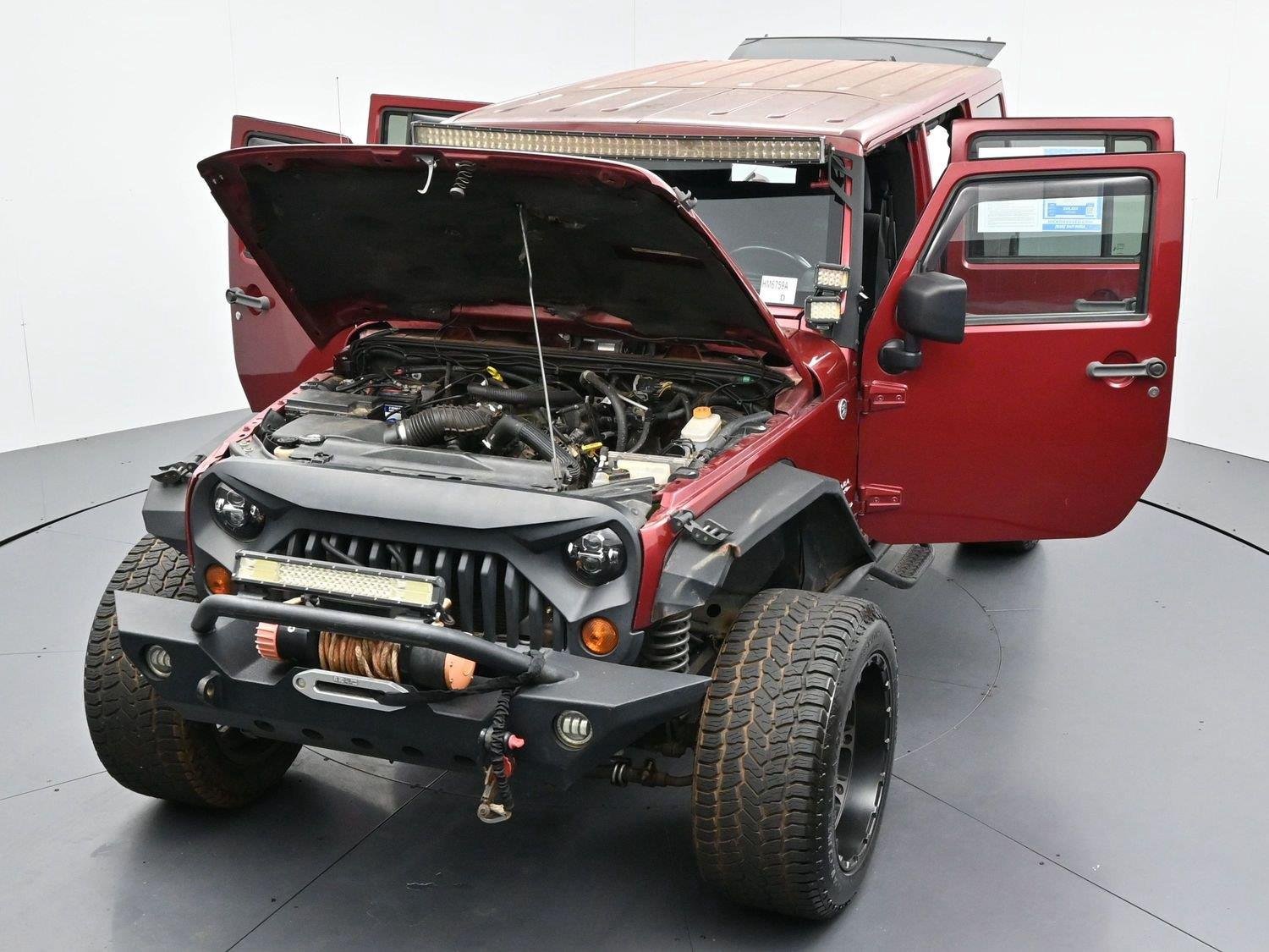 Used 2011 Deep Cherry Red Crystal Pearlcoat Jeep Sahara image 43