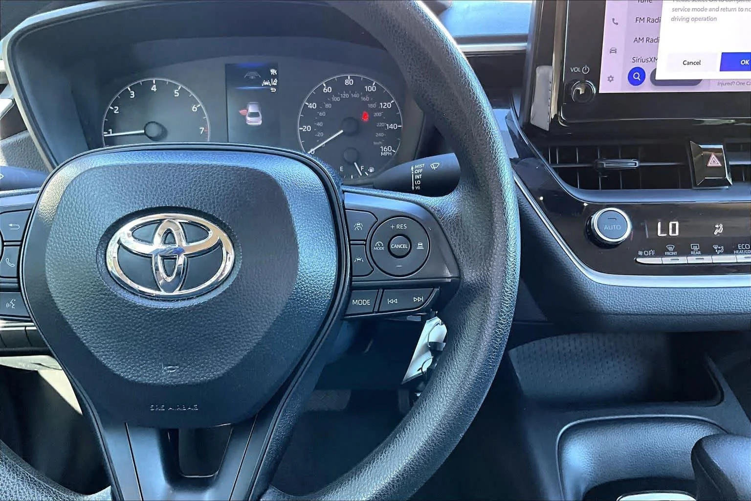 Used 2025 Classic Silver Metallic Toyota LE image 25