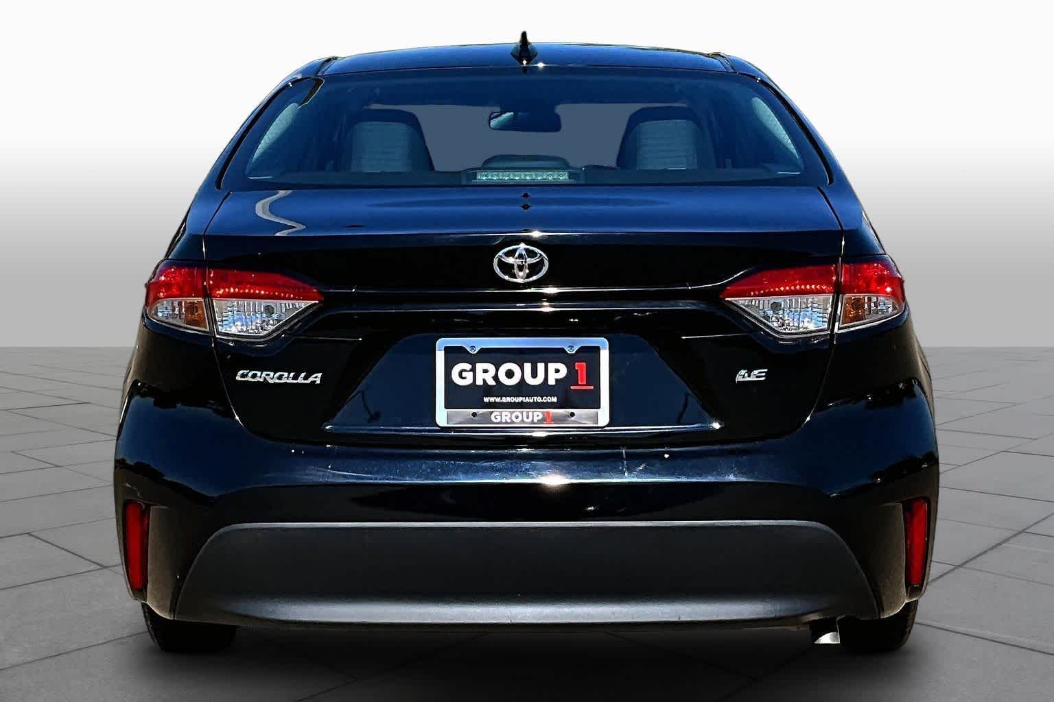 Used 2023 Midnight Black Metallic Toyota LE image 4