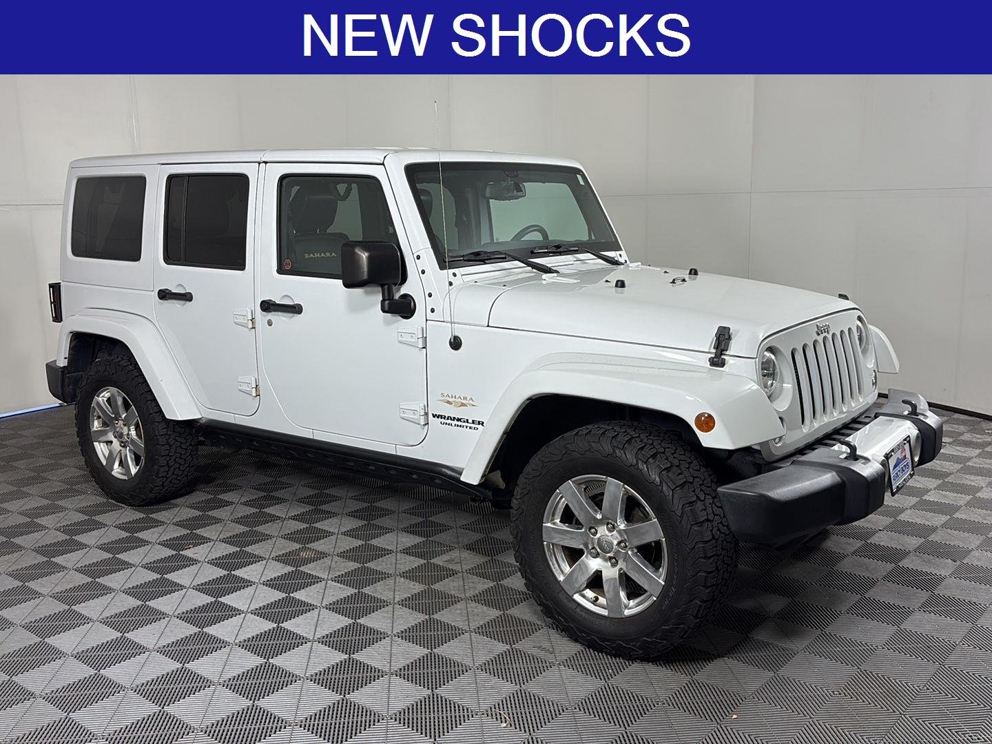Used 2015 Jeep Wrangler Unlimited Sahara with VIN 1C4HJWEG9FL735561 for sale in Salida, CO