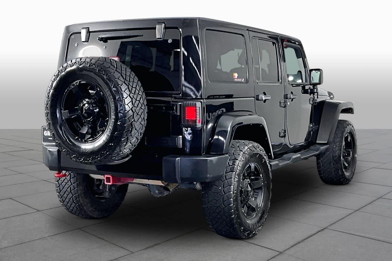 Used 2014 Black Clearcoat Jeep Altitude image 12