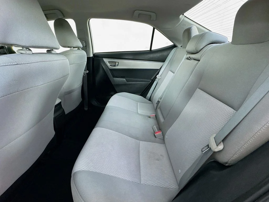 Used 2015 Super White Toyota LE image 24