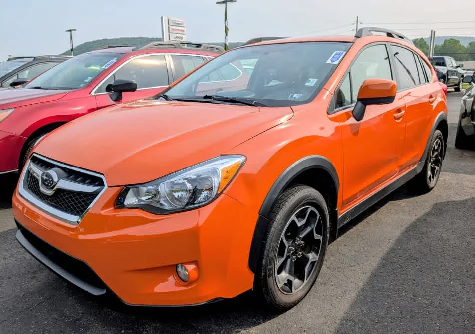 Used 2013 Tangerine Orange Pearl Subaru Limited image 3