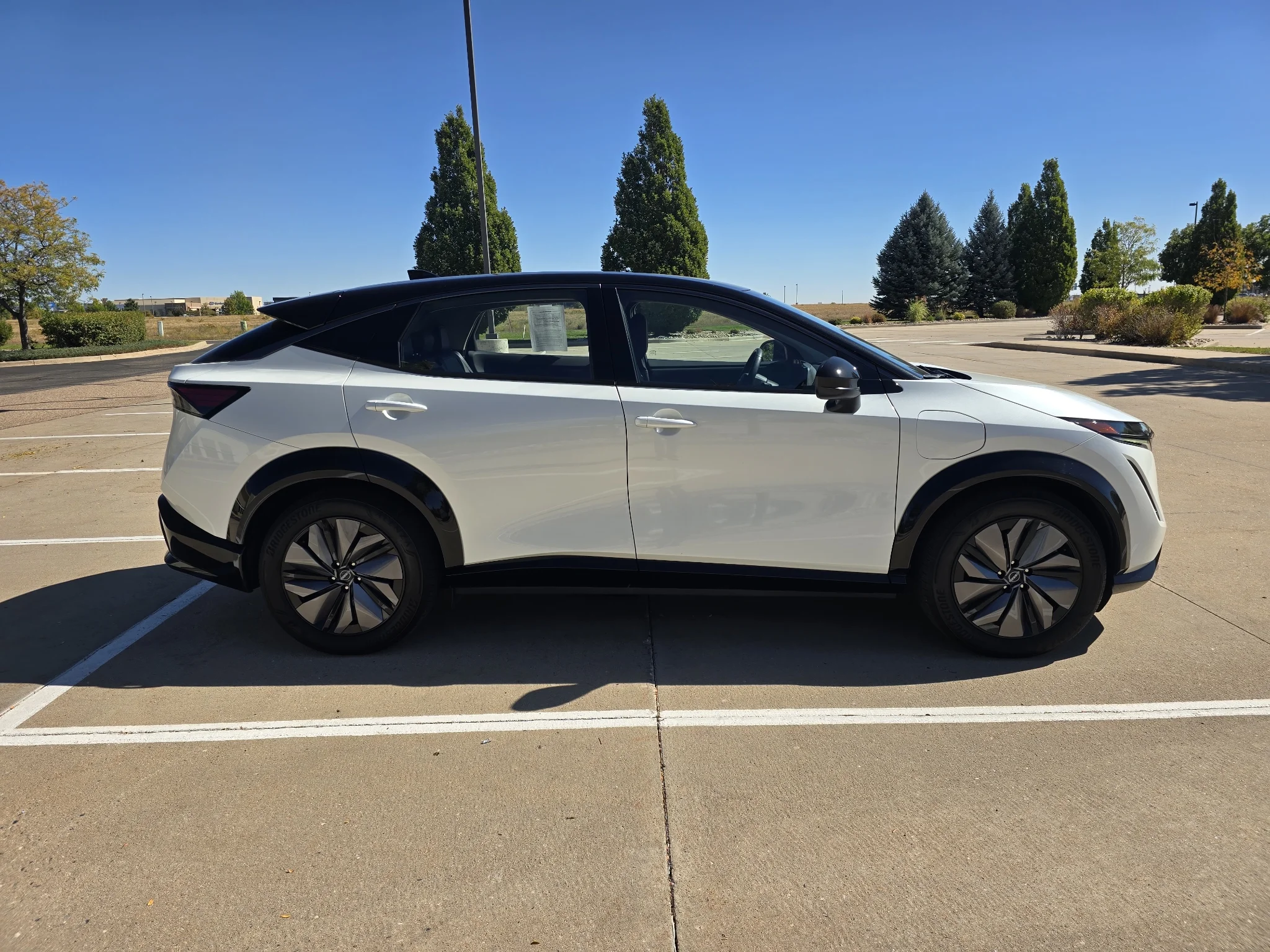 Used 2024 Everest White Pearl Tricoat/Black Diamond Pearl Nissan ENGAGE+ image 6