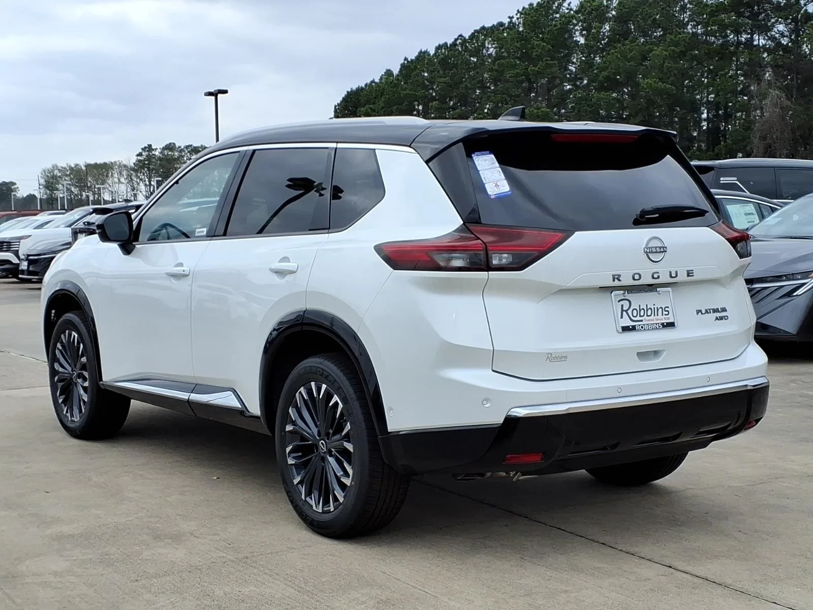 2026 Nissan Rogue Platinum White at Robbins Nissan