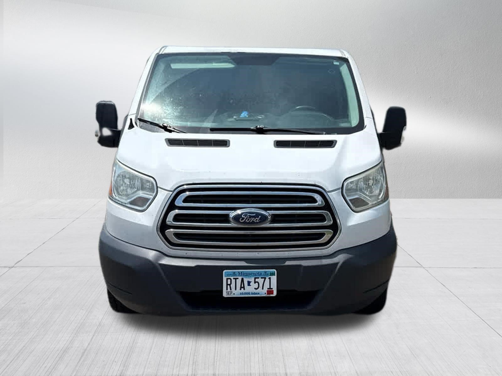 Used 2015 Ford Transit Base with VIN 1FTNR1ZM4FKA70489 for sale in Brooklyn Center, Minnesota