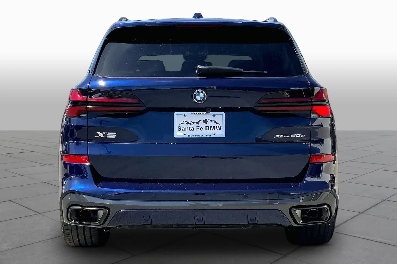 New 2026 Tanzanite Blue II Metallic BMW xDrive50e image 4