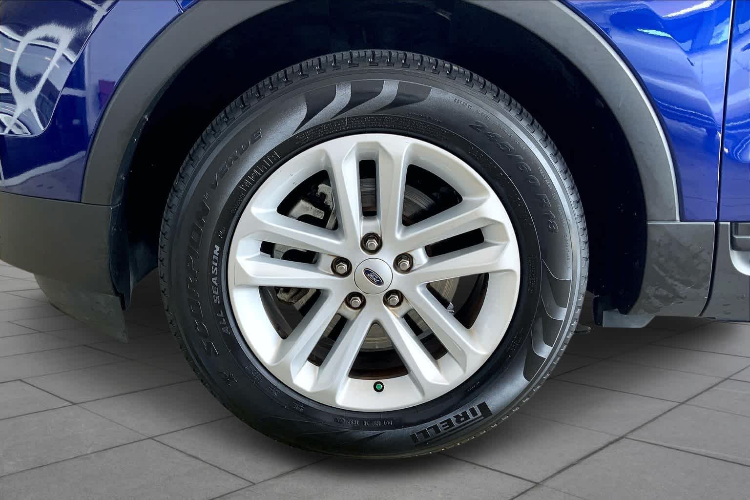 Used 2015 Deep Impact Blue Metallic Ford Base image 11