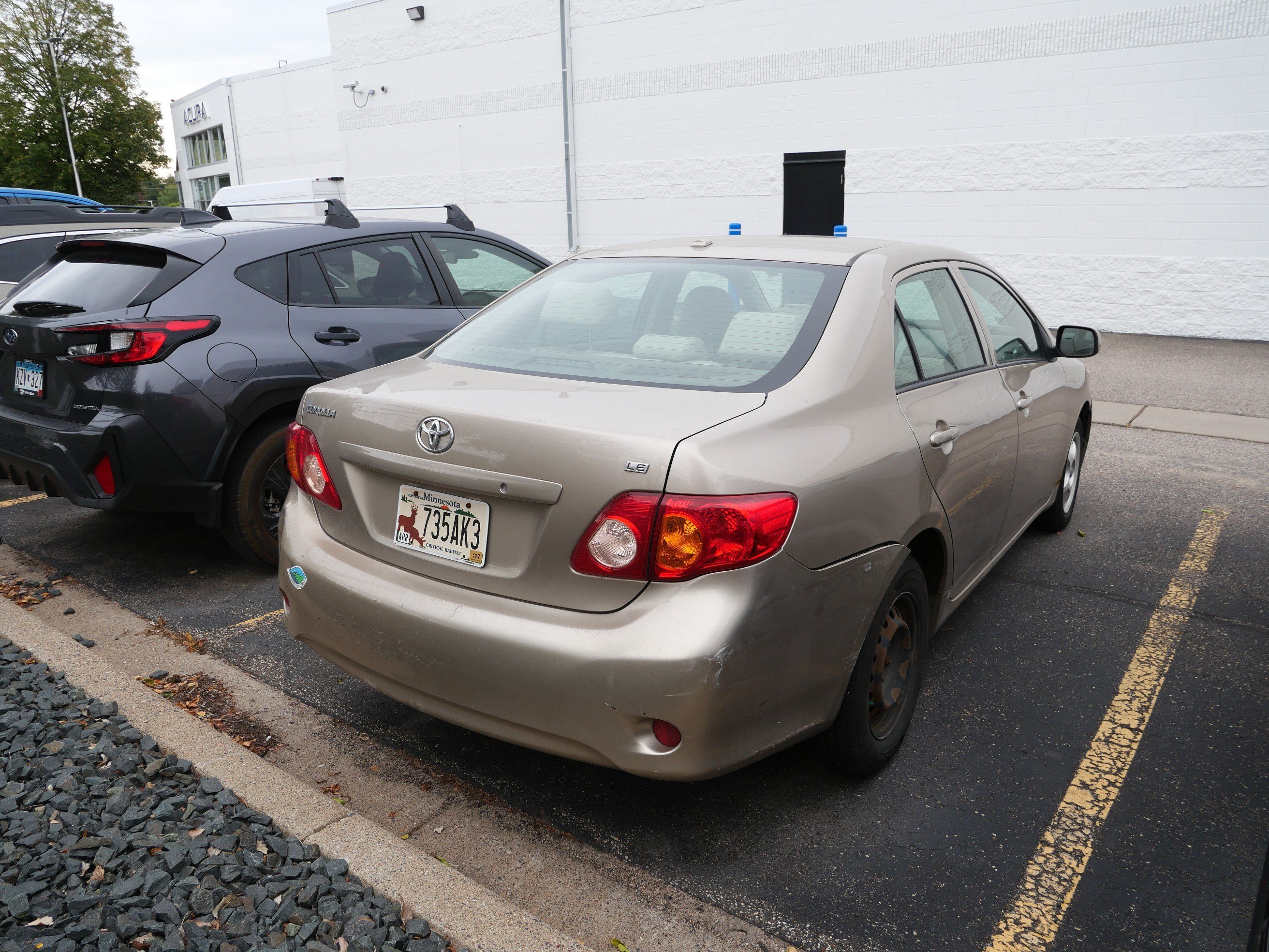 Used 2009 Desert Sand Mica Toyota LE image 8