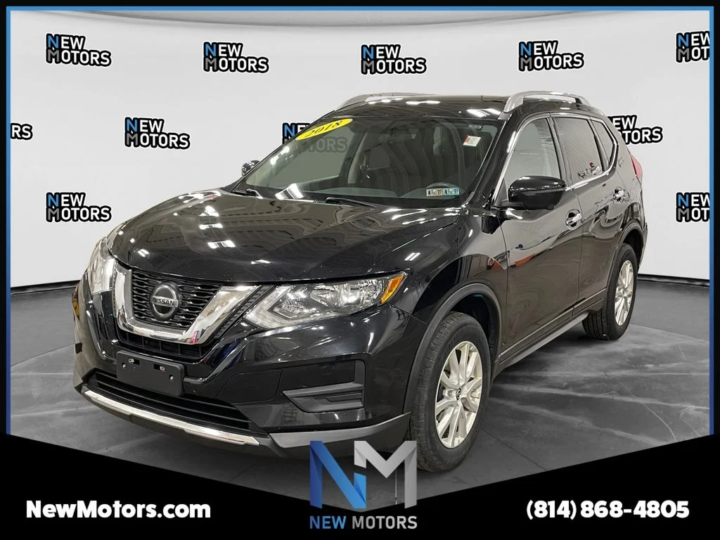 Used 2018 Magnetic Black Nissan SV image 1