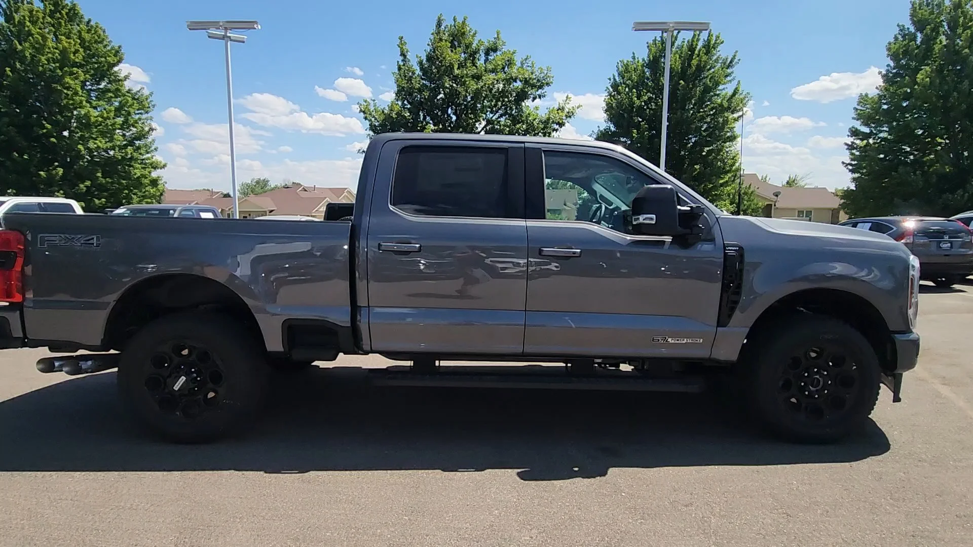 New 2026 Carbonized Gray Metallic Ford LARIAT image 12