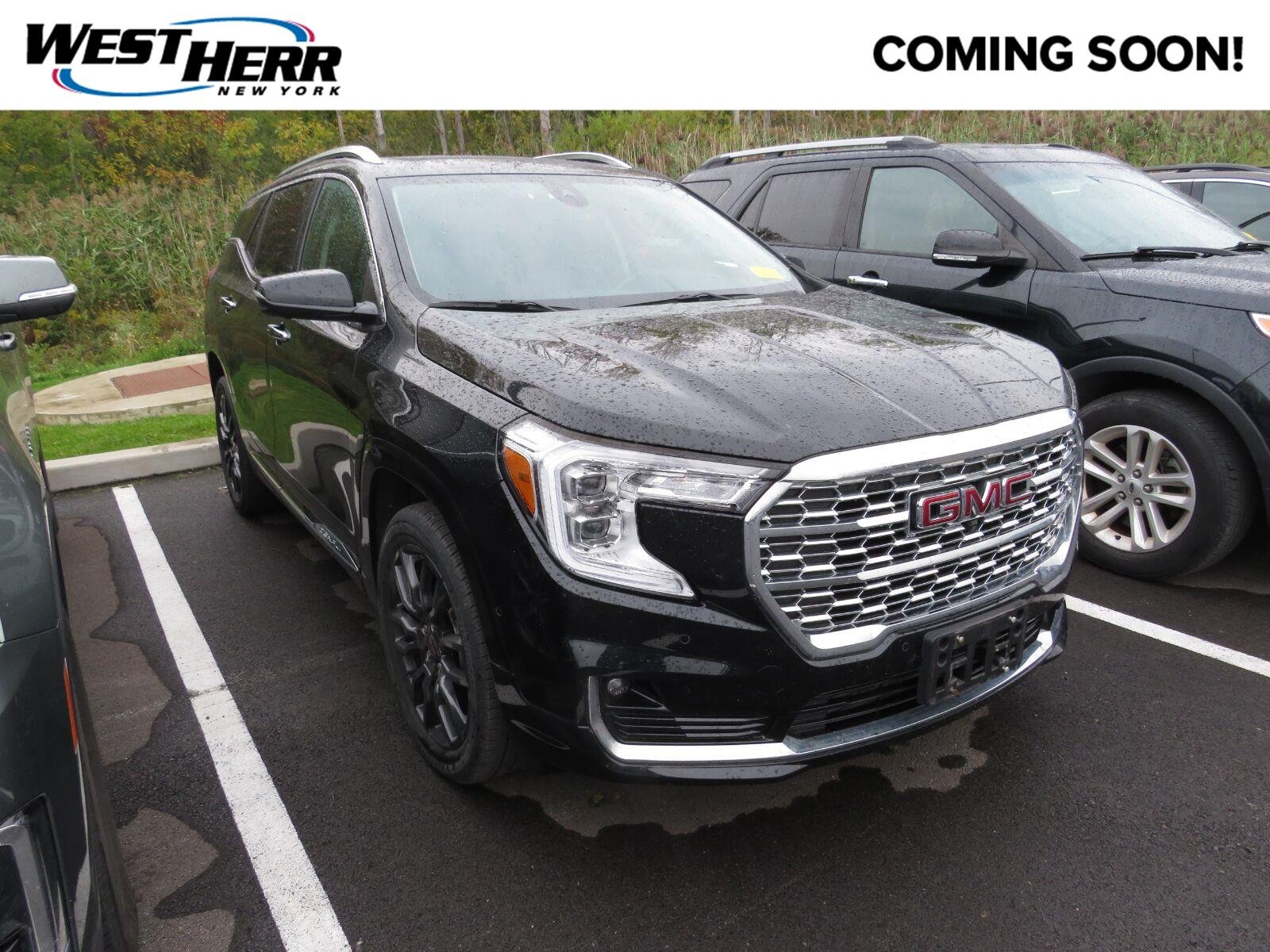 Used 2024 Ebony Twilight Metallic GMC Denali image 1