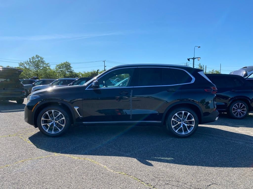 New 2026 Black Sapphire Metallic BMW xDrive40i image 4