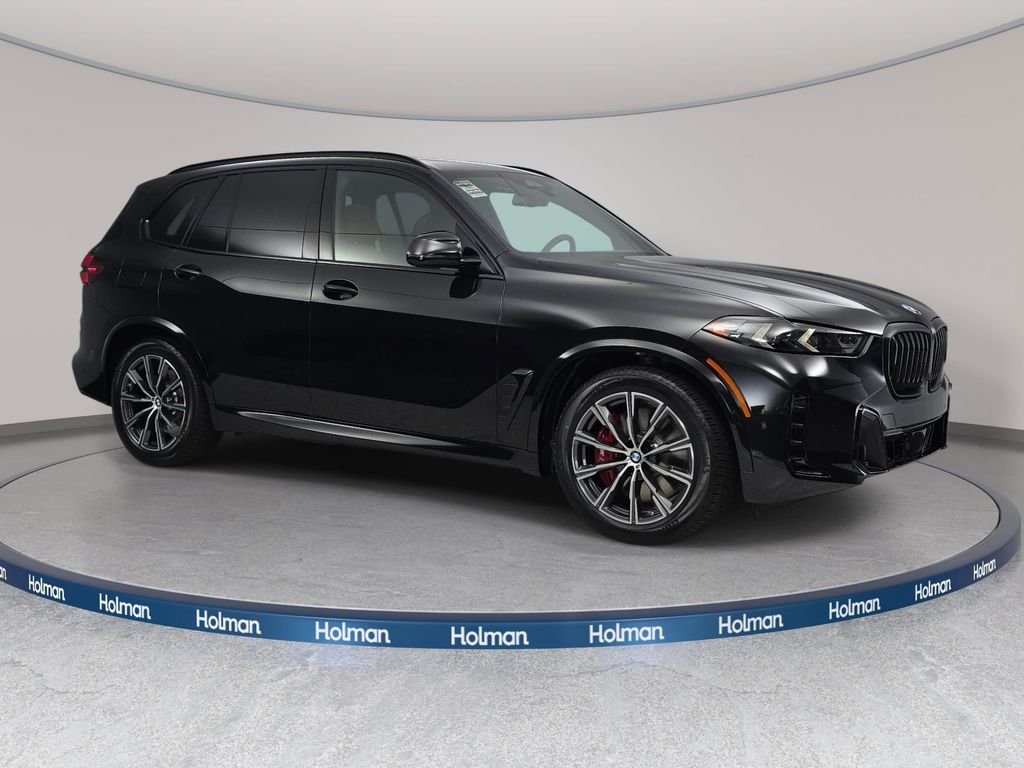 New 2026 Black Sapphire Metallic BMW xDrive50e image 3