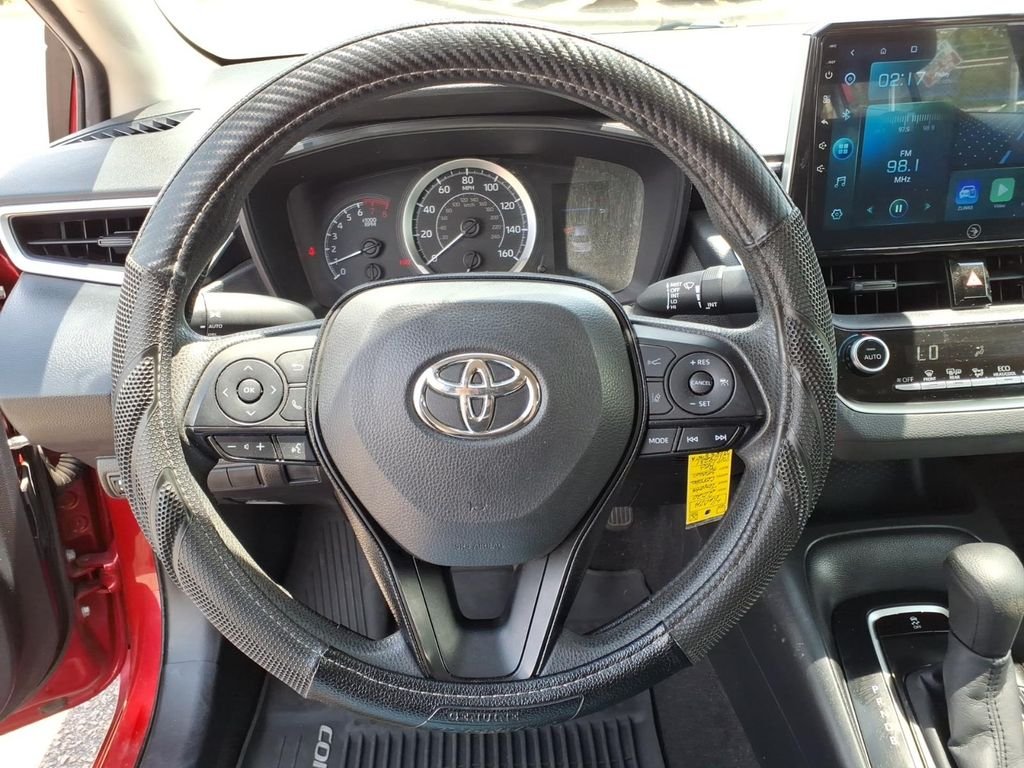 Used 2020 Barcelona Red Metallic Toyota LE image 19