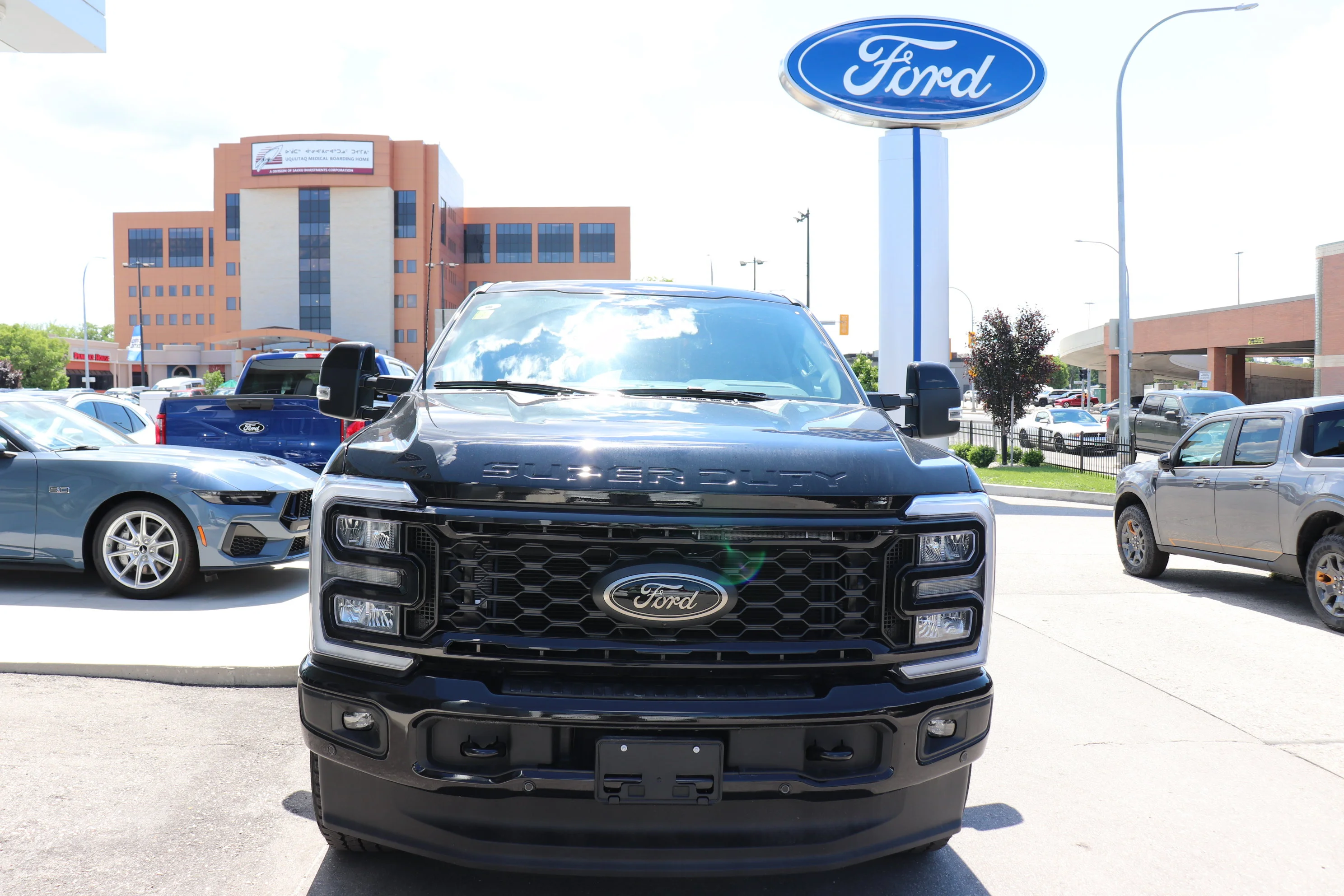 New 2026 AGATE BLACK METALLIC Ford LARIAT image 2