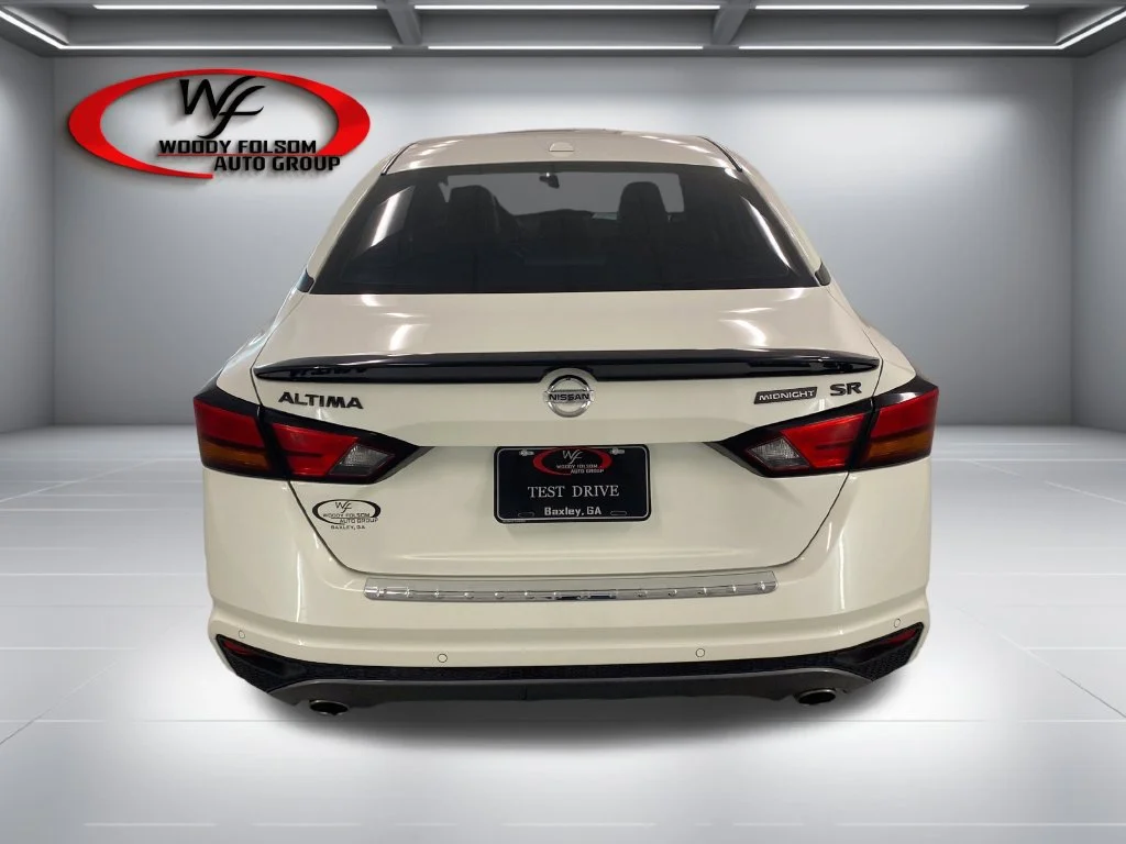 Used 2022 Pearl White Trico Nissan 2.5 SR image 7