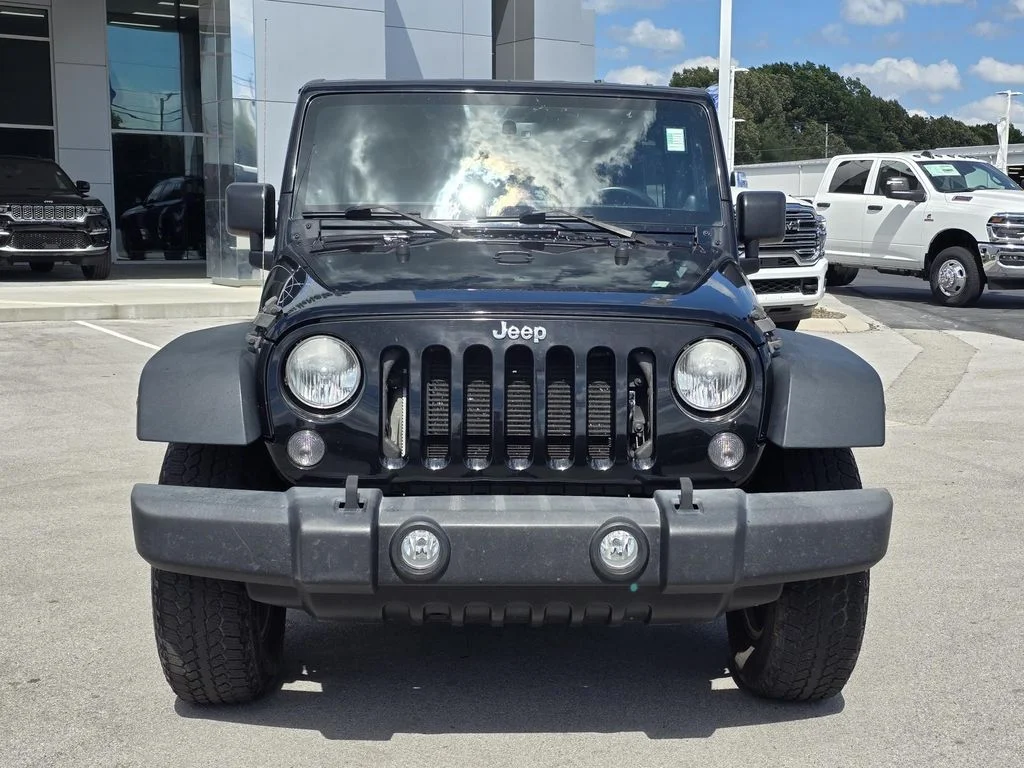Used 2014 Black Clearcoat Jeep Sport image 5