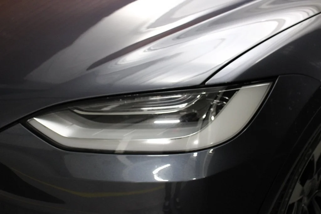Used 2022 Solid Black Tesla Plaid image 4