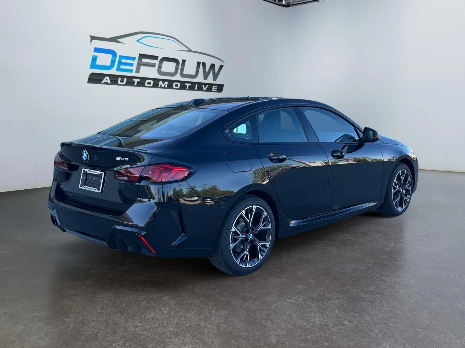 Used 2026 Black Sapphire Metallic BMW 228 xDrive image 3