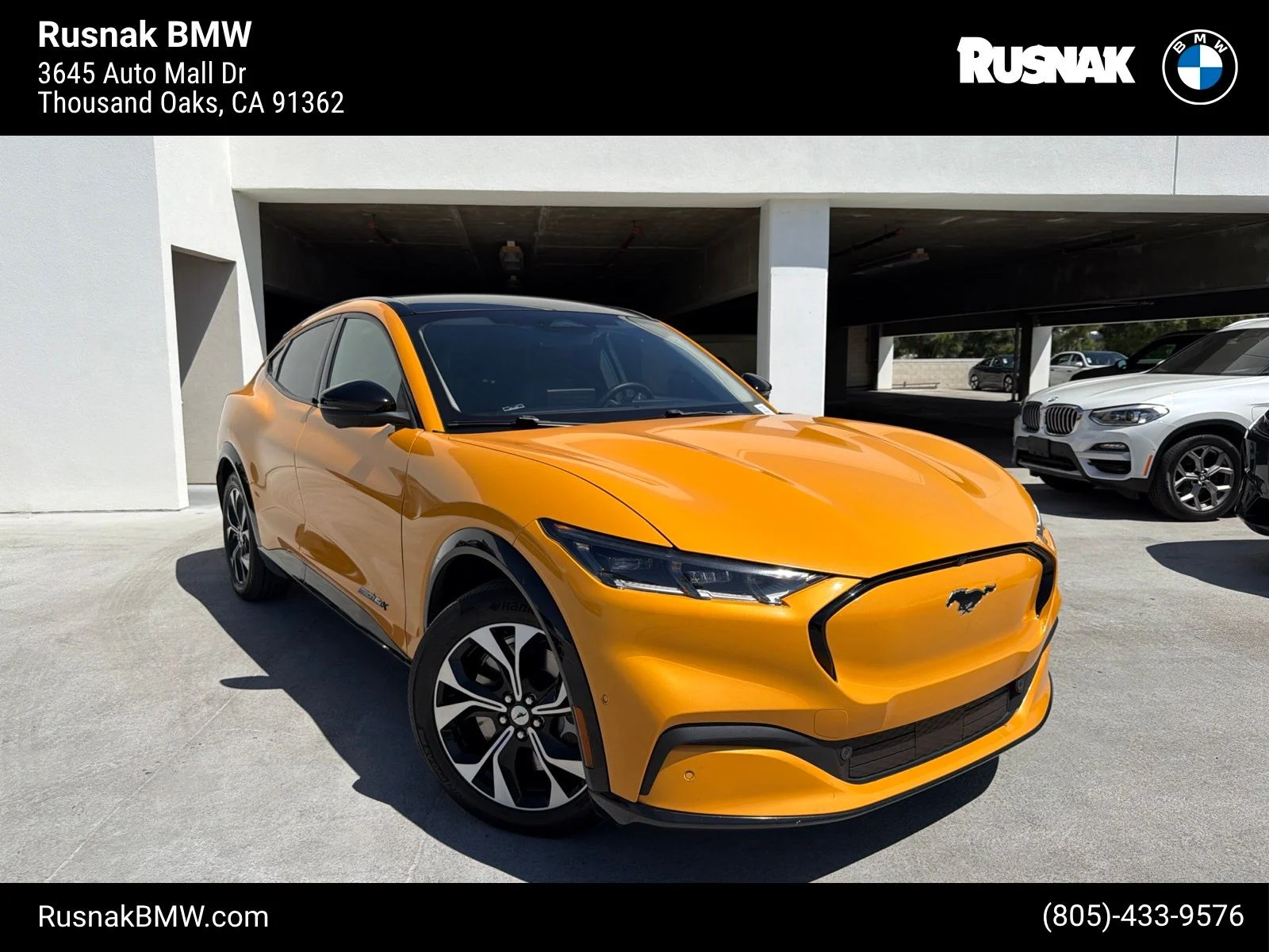 Used 2022 Orange Metallic Ford Premium image 1