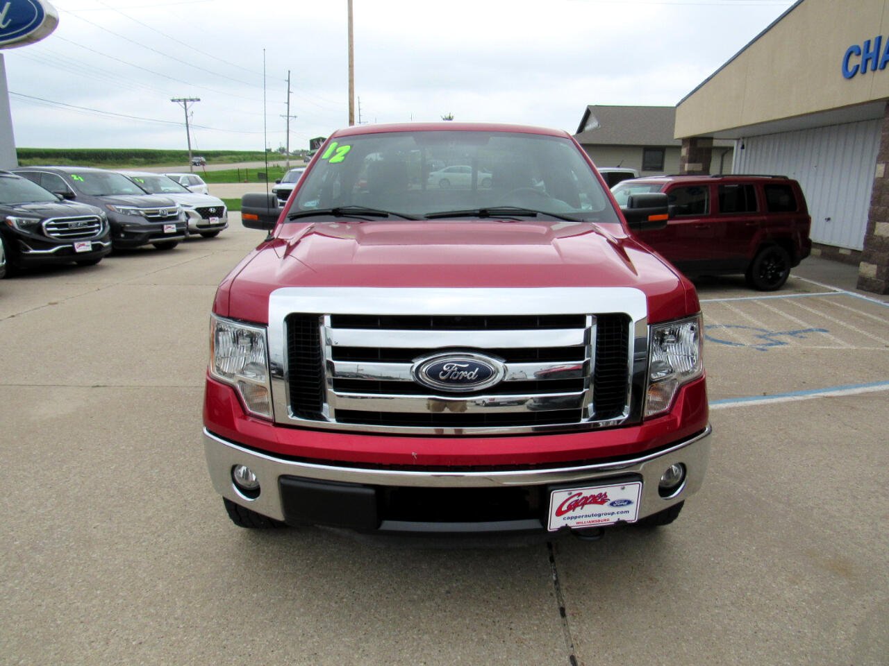Used 2012 Ford F-150 XLT with VIN 1FTNF1ETXCKD57708 for sale in Williamsburg, IA