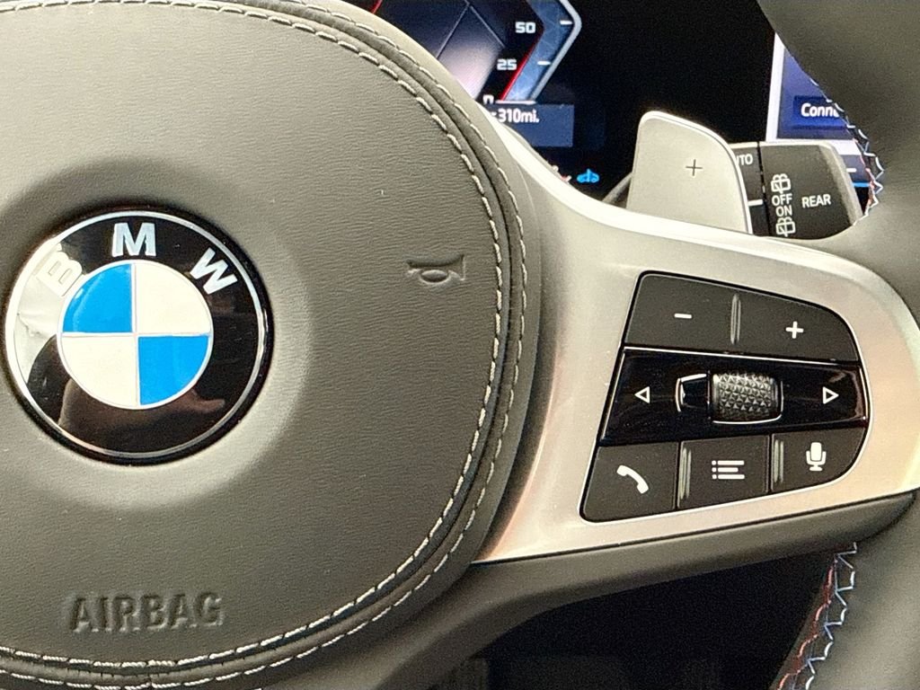 New 2027 White Metallic BMW M60i image 12