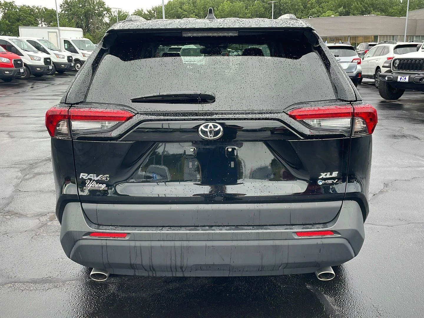 Used 2025 MIDNIGHT BLACK METALLIC TOYOTA TRUCK HYBRID XLE image 4