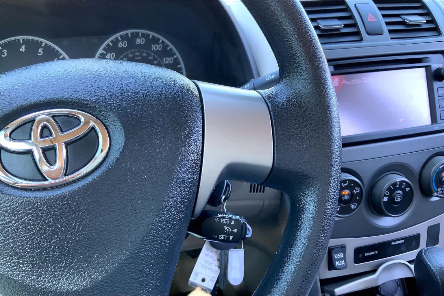 Used 2013 Tropical Sea Metallic Toyota LE image 25