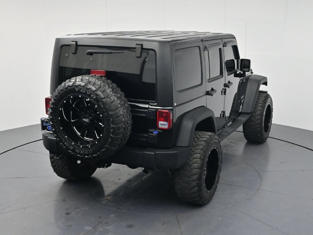 Used 2014 Black Clearcoat Jeep Unlimited Sport image 41