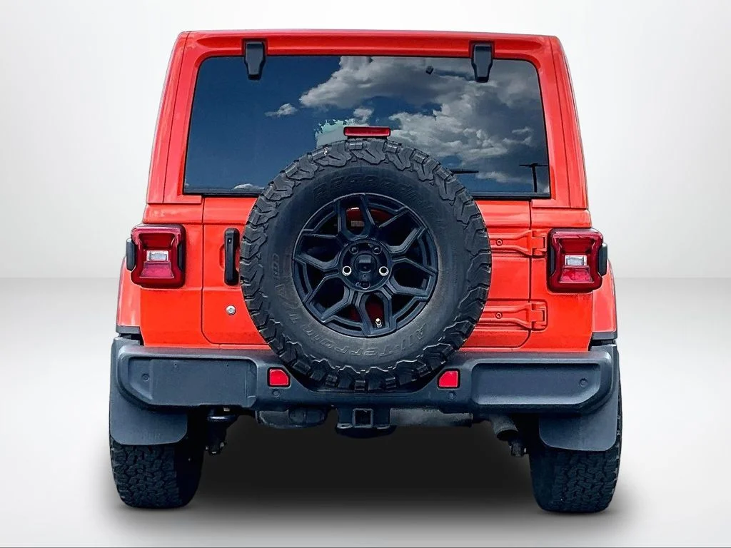 Used 2018 Orange Jeep Unlimited Sahara image 4