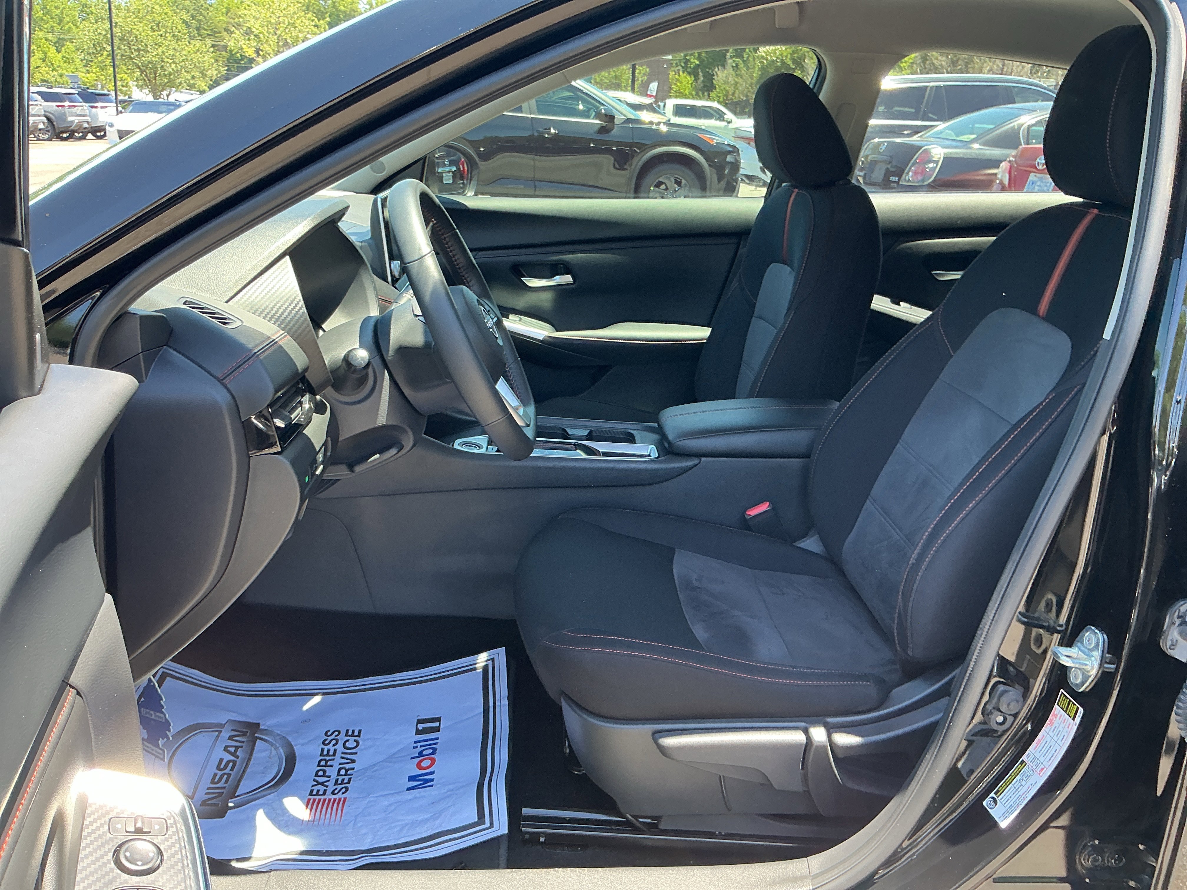 Used 2024 Super Black Nissan SR image 12