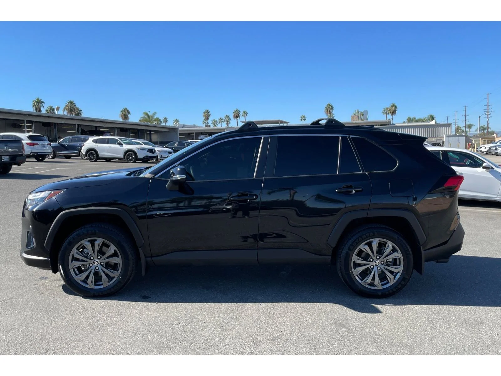 Used 2024 Midnight Black Metallic Toyota Hybrid XLE Premium image 2