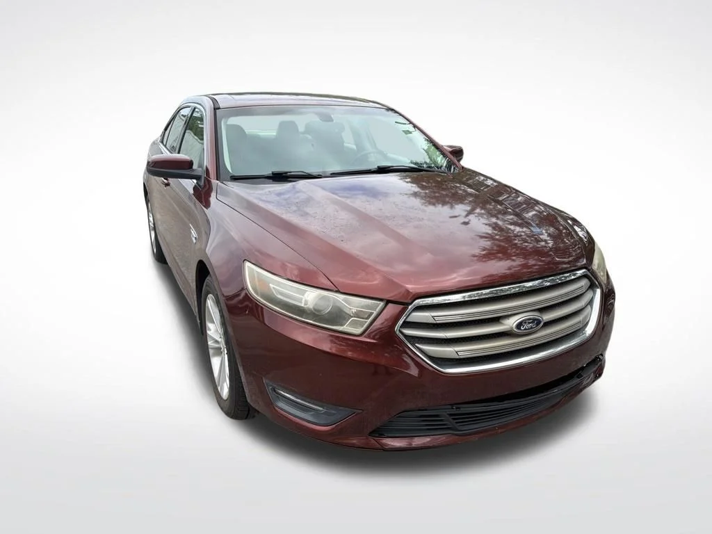 Used 2015 Ford Taurus SEL with VIN 1FAHP2E84FG112413 for sale in Fort Pierce, FL