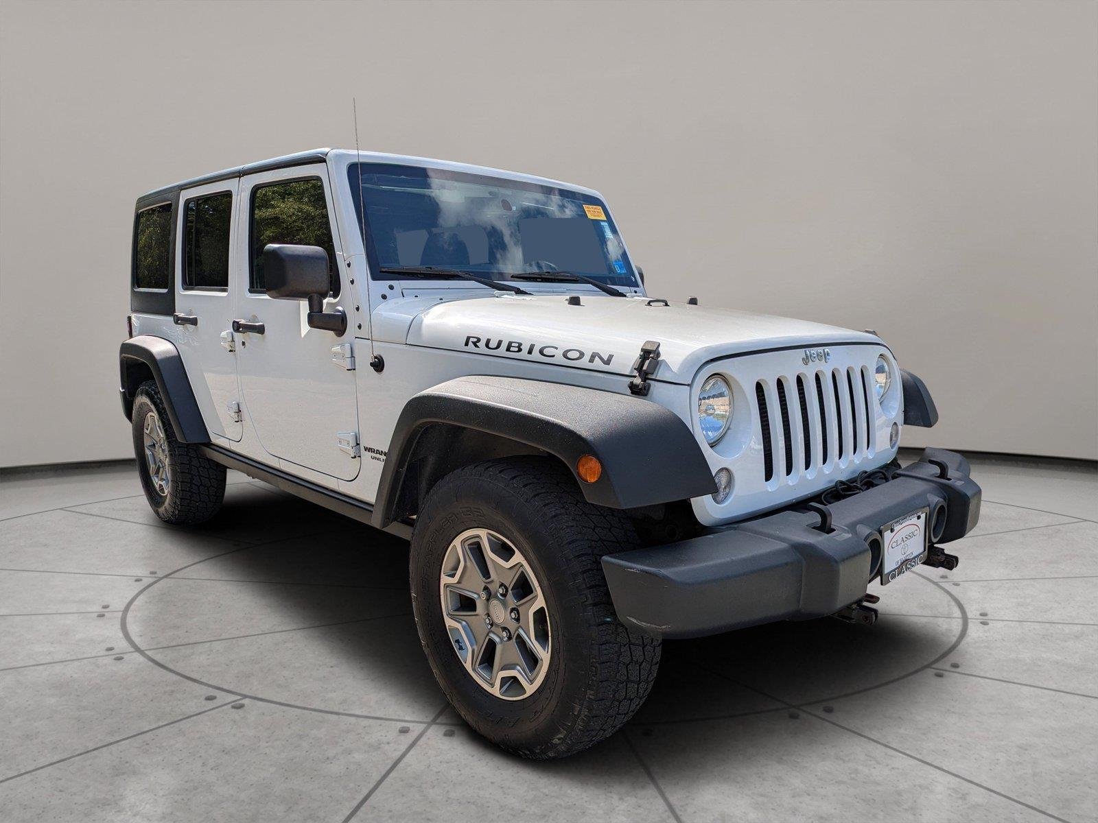 Used 2015 Bright White Clearcoat Jeep Rubicon image 1